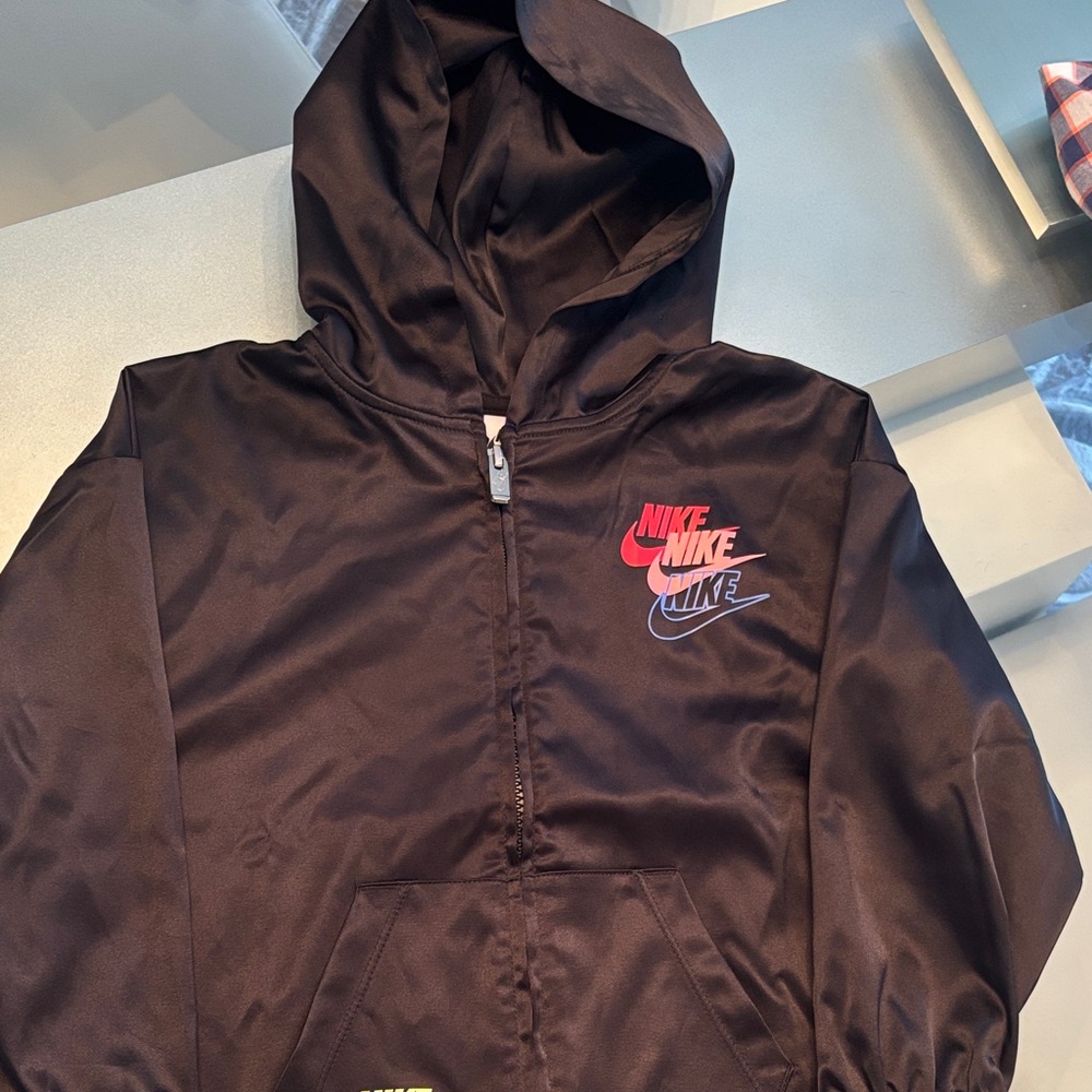 Nike Black Jacket with Red and Blue Accents